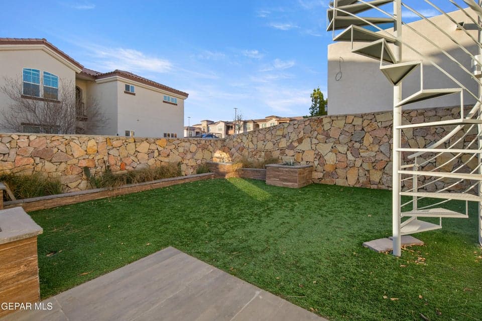 Stairs leading to the large balcony