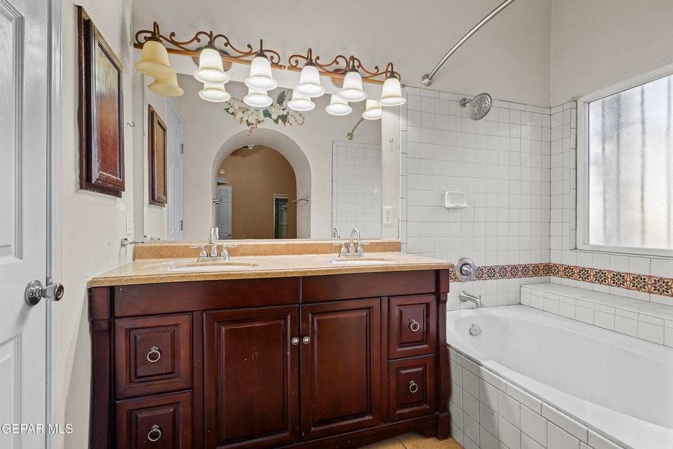 The primary bath includes a full bath with a functional layout. Clean finishes create a fresh and relaxing feel.