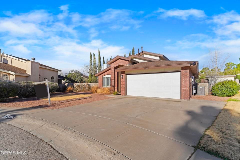 The front garage provides convenient parking and additional storage. It allows easy access to the home. Designed for everyday functionality, it adds practical value.