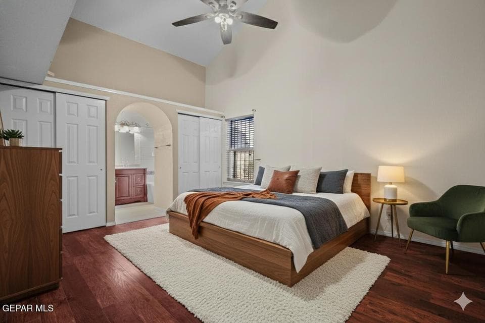 The primary suite offers a private and comfortable retreat. Its spacious layout provides room to relax and unwind.