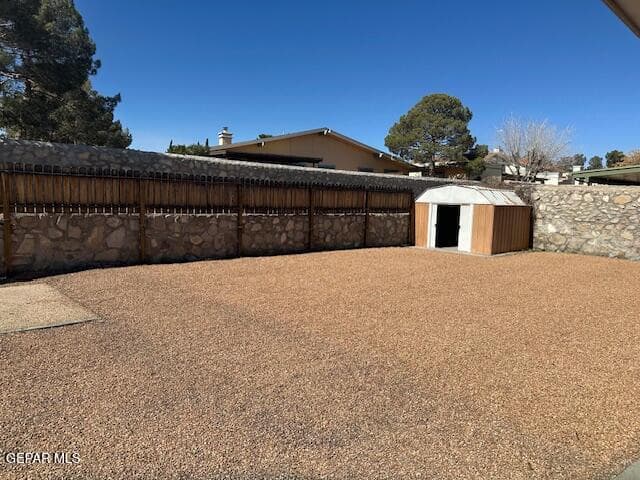 STORAGE SHED IN BACKYARD