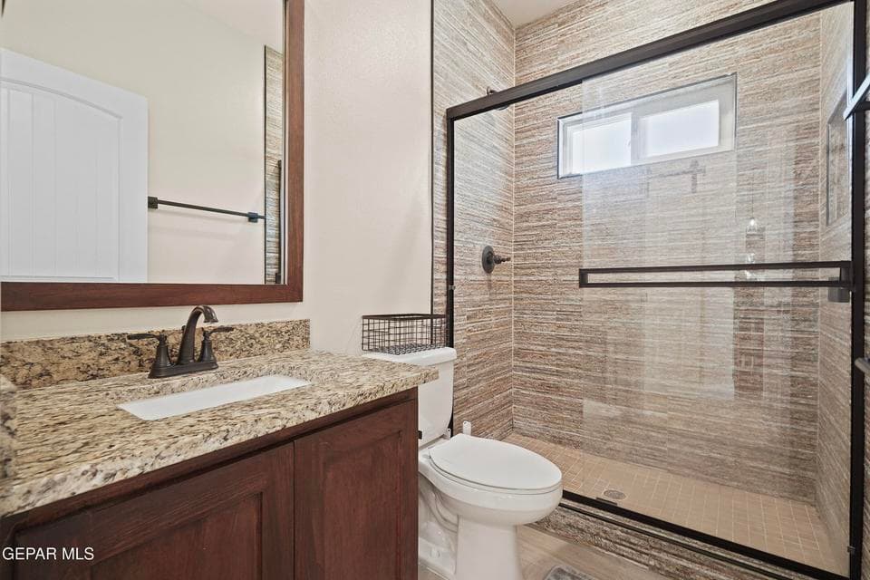 Great bath for guests- step in shower with tile surround