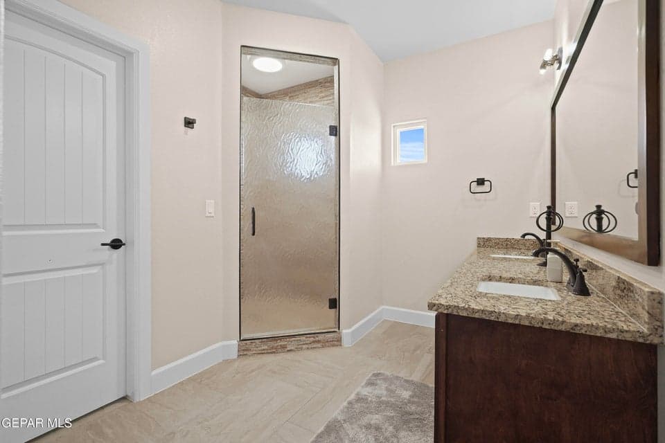 Upgraded counters, step-in shower, and tile flooring